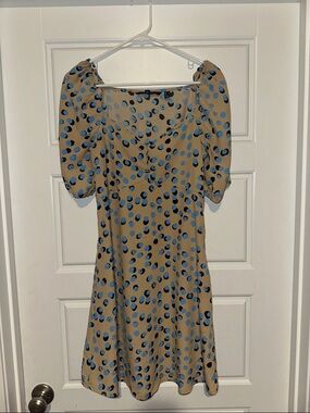 beige polka dot mini dress